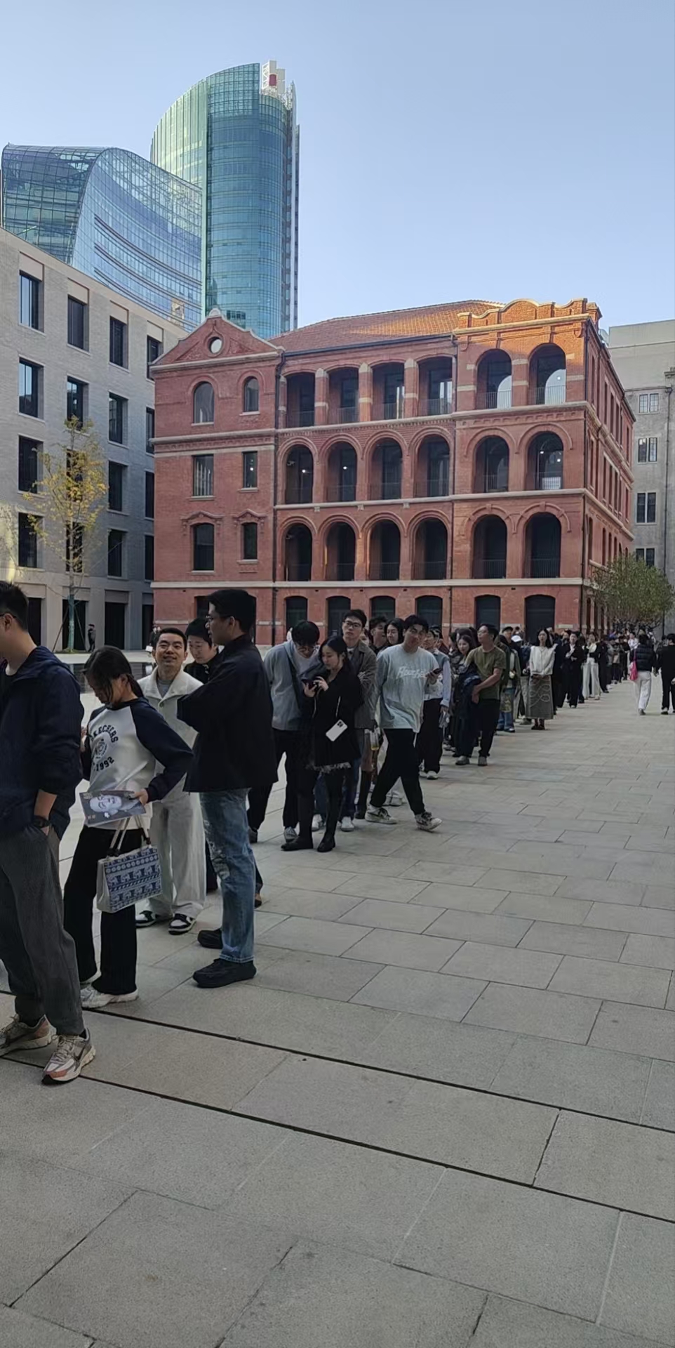 High-resolution project photo showing a long visitor queue outside the Dalí exhibition venue in Shanghai
