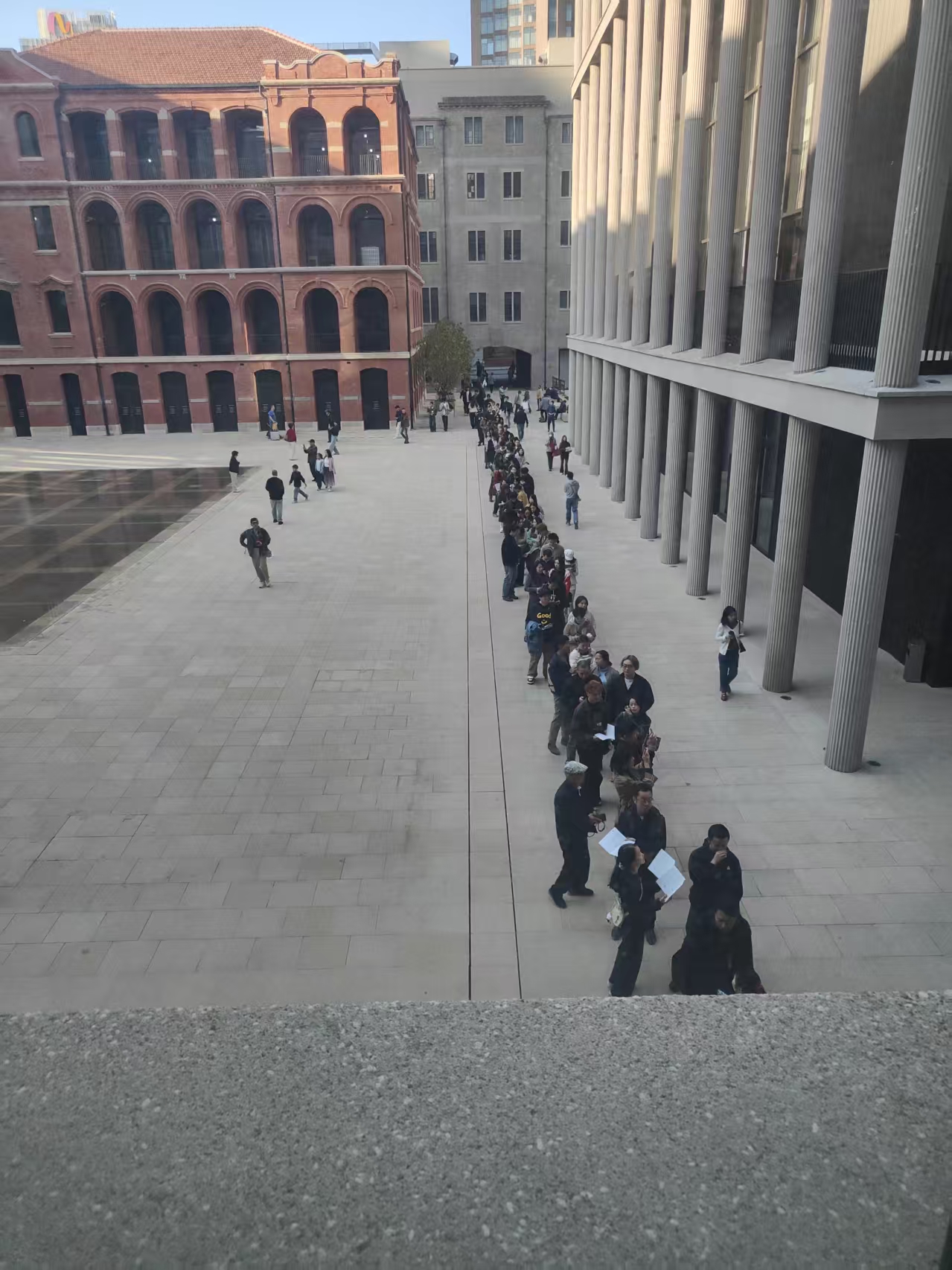 High-resolution project photo showing strong exhibition attendance and queueing visitors at the Dalí exhibition